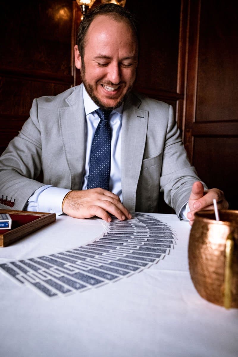 Kostya Kimlat performing close-up magic for restaurant guests