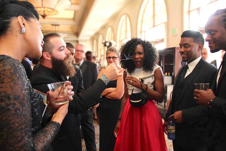 magician performing close-up magic for guests at a reception